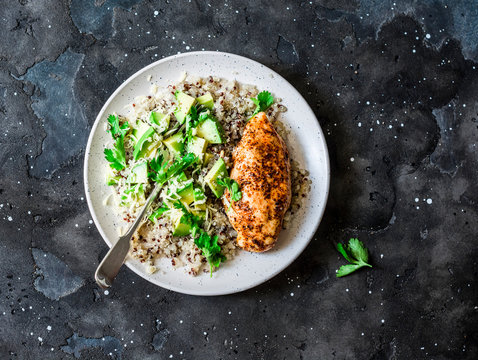 Quinoa, Roasted Chicken Breast, Avocado, Cheese, Cilantro Bowl On Dark Background, Top View. Healthy Eating Concept