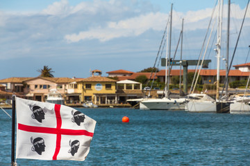 The flag of Sadinia on the sardinian coast Costa Smeralda - 271073037