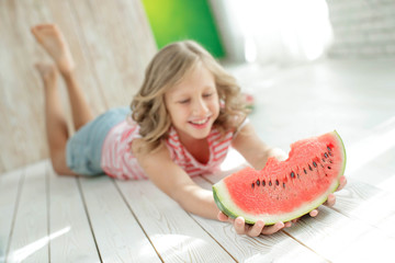 Girl child with watermelon 