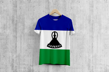 Lesotho flag T-shirt on hanger, team uniform design idea for garment production. National wear.