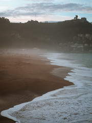 Ondarrete beach in San Sebastian on a foggy day