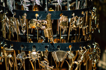 Closeup of traditional decorative objects sold in souvenirs shops in the streets of Reims in France