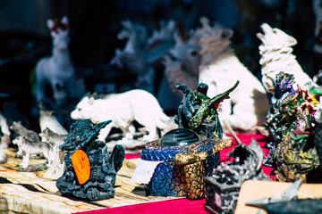 Closeup of traditional decorative objects sold in souvenirs shops in the streets of Reims in France