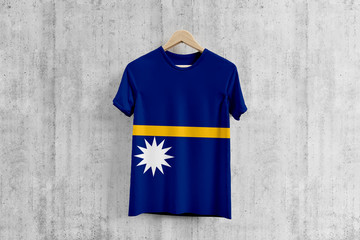 Nauru flag T-shirt on hanger, Nauruan team uniform design idea for garment production. National...