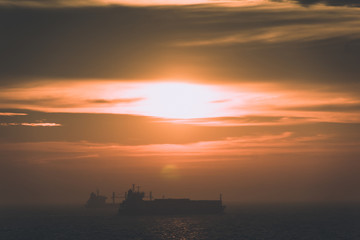 Fototapeta na wymiar Puttgarden fehmarn sunset waterway ship