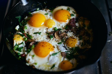 Homemade fried eggs in a pan top view space for text 