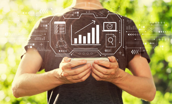 Marketing concept with young man holding his smartphone outside