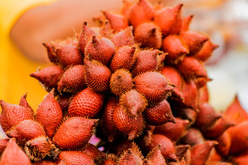 Salak Palm or snake fruit for sale in the fruit market / Salacca zalacca