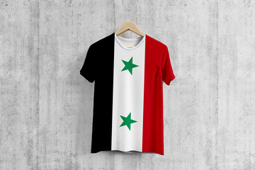 Syria flag T-shirt on hanger, Syrian team uniform design idea for garment production. National wear.