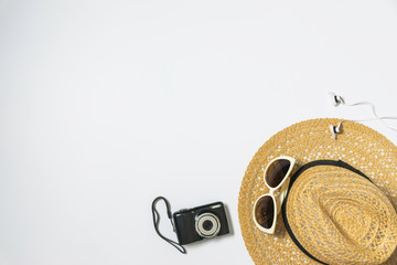 Flat lay, top view with hat,camera,