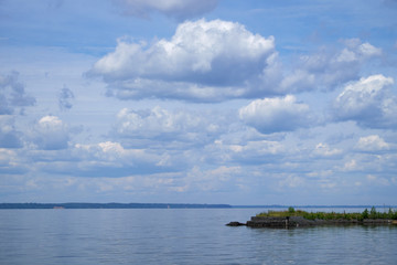 background white fluffy clouds high in the sky