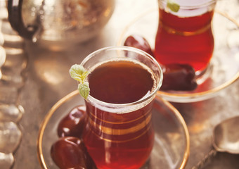 Turkish tea in traditional glass cups on the tray