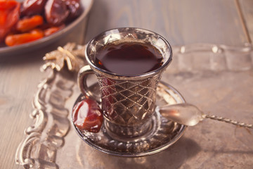 Turkish tea in cup on the metal tray