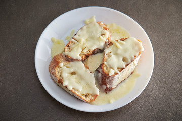Baguette slice with melting cheese