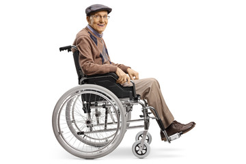 Senior man in a wheelchair smiling at the camera