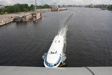 view from the bridge to the Neva river and boats of St. Petersburg   