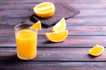 Fresh orange juice on the table,  rustic style