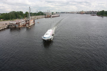 view from the bridge to the Neva river and boats of St. Petersburg   
