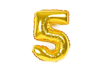 Golden foil number party balloon isolated on white background