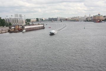 view from the bridge to the Neva river and boats of St. Petersburg   