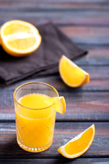 Fresh orange juice on the table,  rustic style