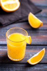 Fresh orange juice on the table,  rustic style