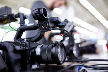 Behind the scenes of video production or video shooting. The concept of production of video content for TV, blog, shows, movies. Cameras prepared for video filming