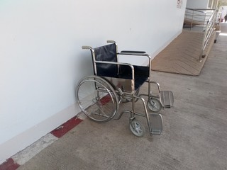 wheelchair in hospital corridor