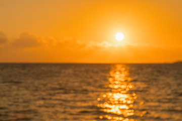 Obraz premium Colorful dawn over the sea, Sunset. Beautiful magic sunset over the sea. Beautiful sunset over the ocean. Sunset over water surface. blurry