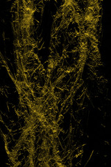 Transparent yellow plastic wrap on the black background. Plastic shopping bag texture. Reusable trash and waste.