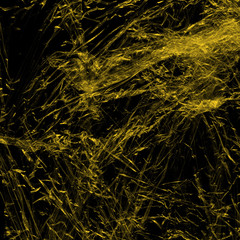 Transparent yellow plastic wrap on the black background. Plastic shopping bag texture. Reusable trash and waste.