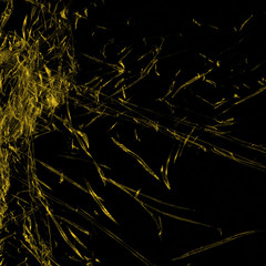 Transparent yellow plastic wrap on the black background. Plastic shopping bag texture. Reusable trash and waste.