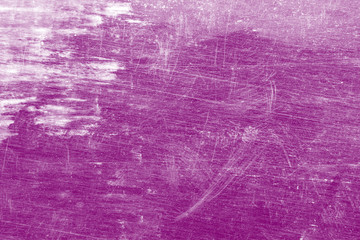 Grunge, dirty, scratched, unevenly colored purple background.