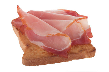 slice of broad for sandwich with ham slices isolated on white background