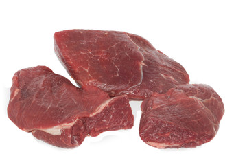 three steaks of fresh beef isolated