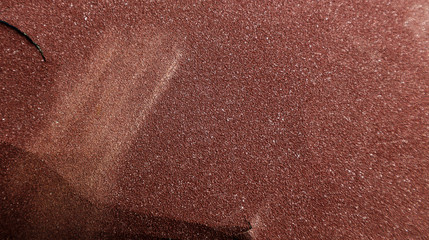 Texture of brown sandpaper with scratches and tear close-up - obrazy, fototapety, plakaty