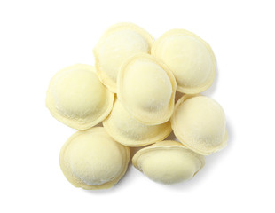 Pile of raw dumplings on white background, top view
