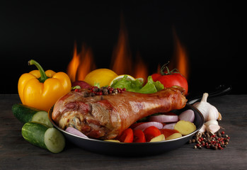 roasted leg of turkey hen on wooden background