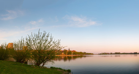 Fototapeta na wymiar Spring panorama of Elk city from the shore of the lake. Masuria, Poland.