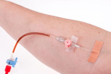Needle to pierce vein in arm. World blood donor day