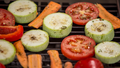  Barbecue on a  wooden terrace concept. Grilled vegetables, marshmallow outdoors