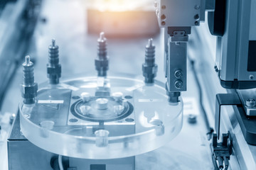 The spark plug manufacturing process with automation systems. The hi technology manufacturing process in automotive industry.