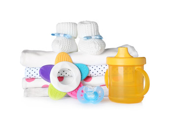 Set of baby accessories on white background