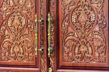 Ancient Wooden  Door with Golden Door Handle 