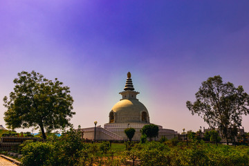 Fototapeta na wymiar 4 May 2019; an Indian landmark - Vishwa Shanti Stupa, also known as the World Peace Pagoda on a blue sky background at midday, New Delhi, India.