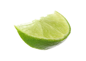 Cut fresh juicy lime on white background