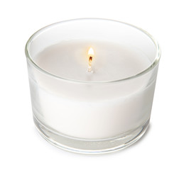 Burning candle in glass holder on white background