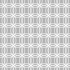 seamless geometric background of intersecting circles white on grey background