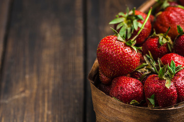 ugly strawberries in a wicker basket