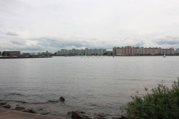 a view of the river, boats and buildings  